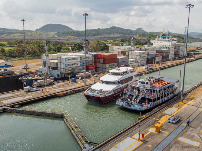 small boats entering miraflores locks in the Panama Canal