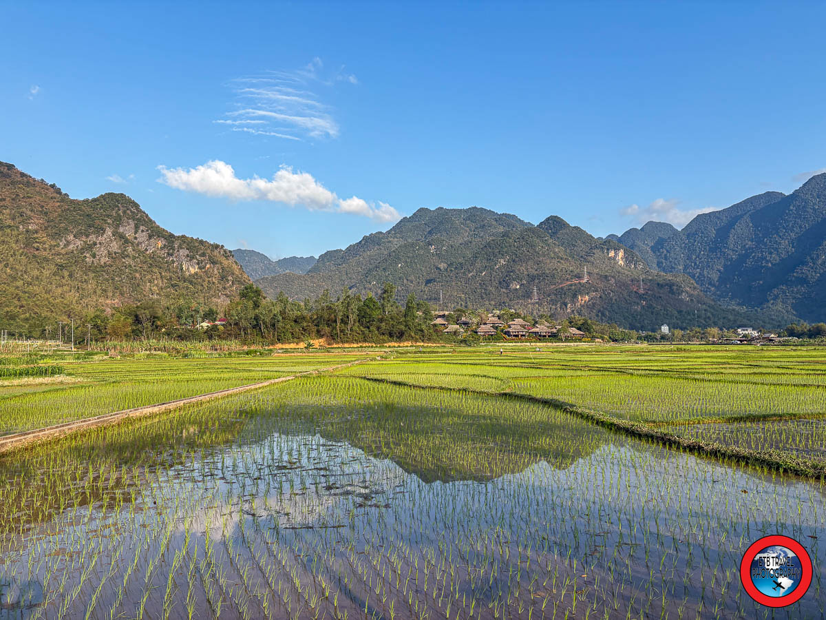 reflection of mountains in the rice paddies of Mai Chau